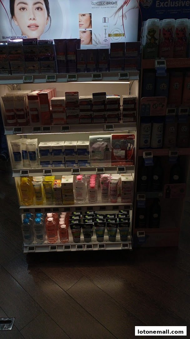 A display of skincare and personal care products, featuring L'Oreal and Garnier brands.