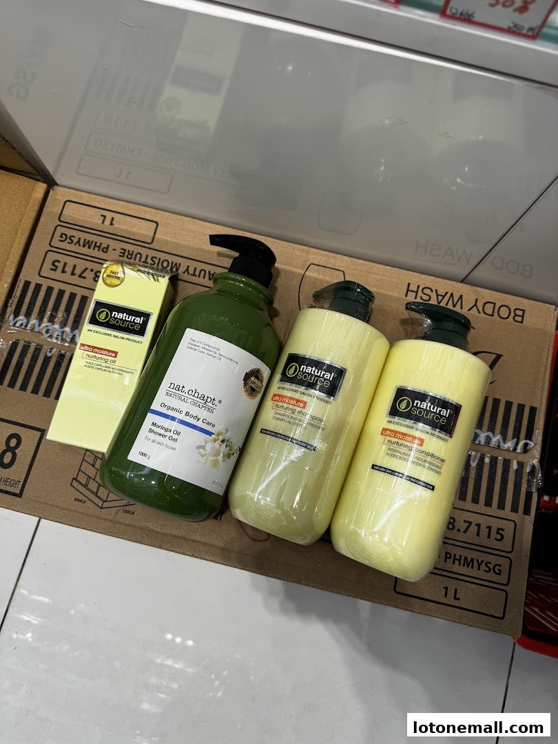 A collection of Natural Source and Nat. Chapt. body care products, including shower gel, shampoo, and conditioner.