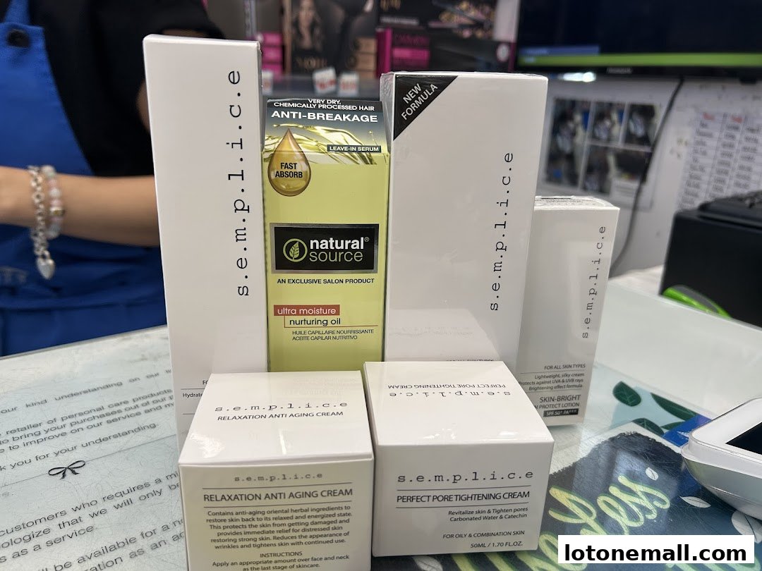 A display of Semplice skincare products including anti-aging cream and pore tightening cream.