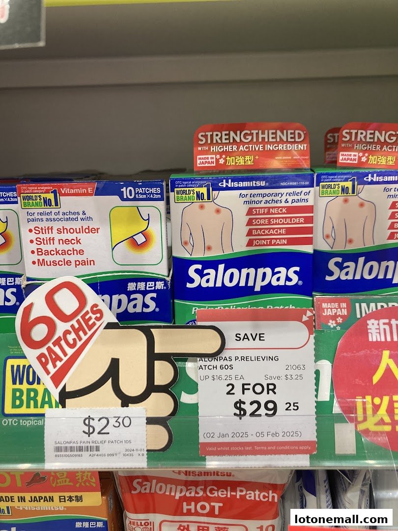A shelf display of Salonpas pain relief patches with pricing and promotional information.