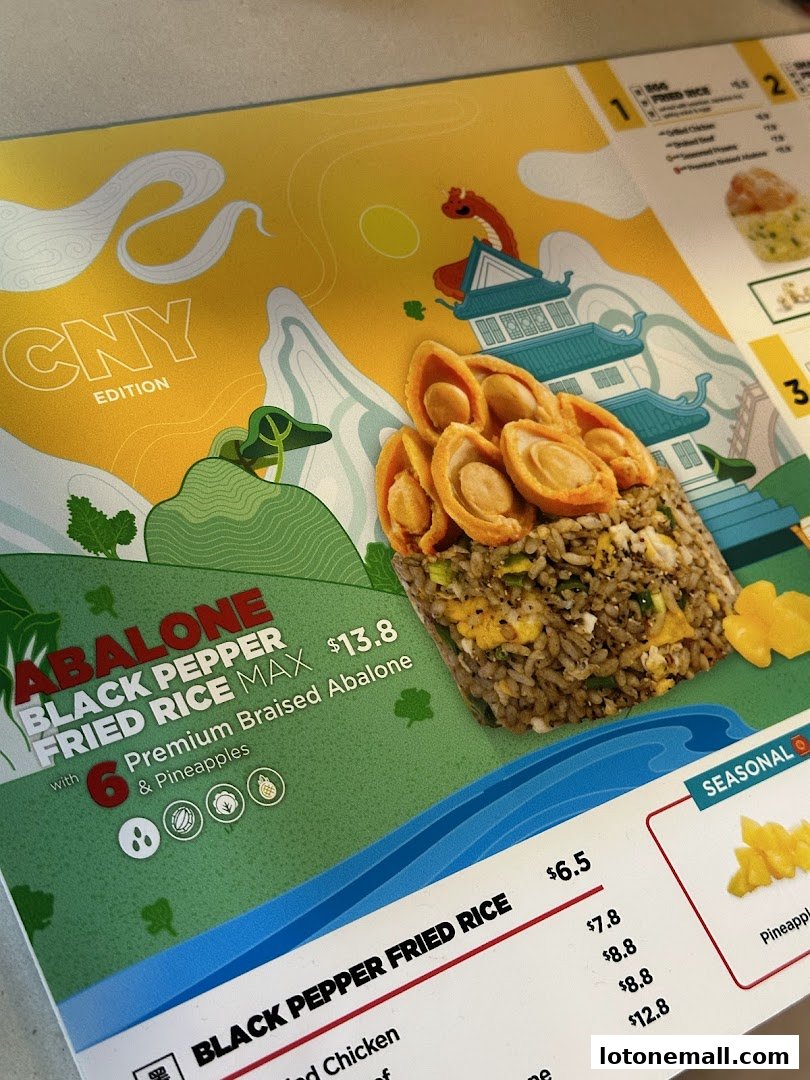 A menu featuring Abalone Black Pepper Fried Rice and other fried rice options.