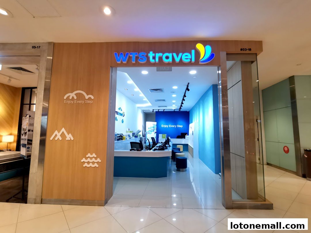 The entrance of WTS Travel & Tours Pte Ltd, a travel agency with a bright and modern interior.