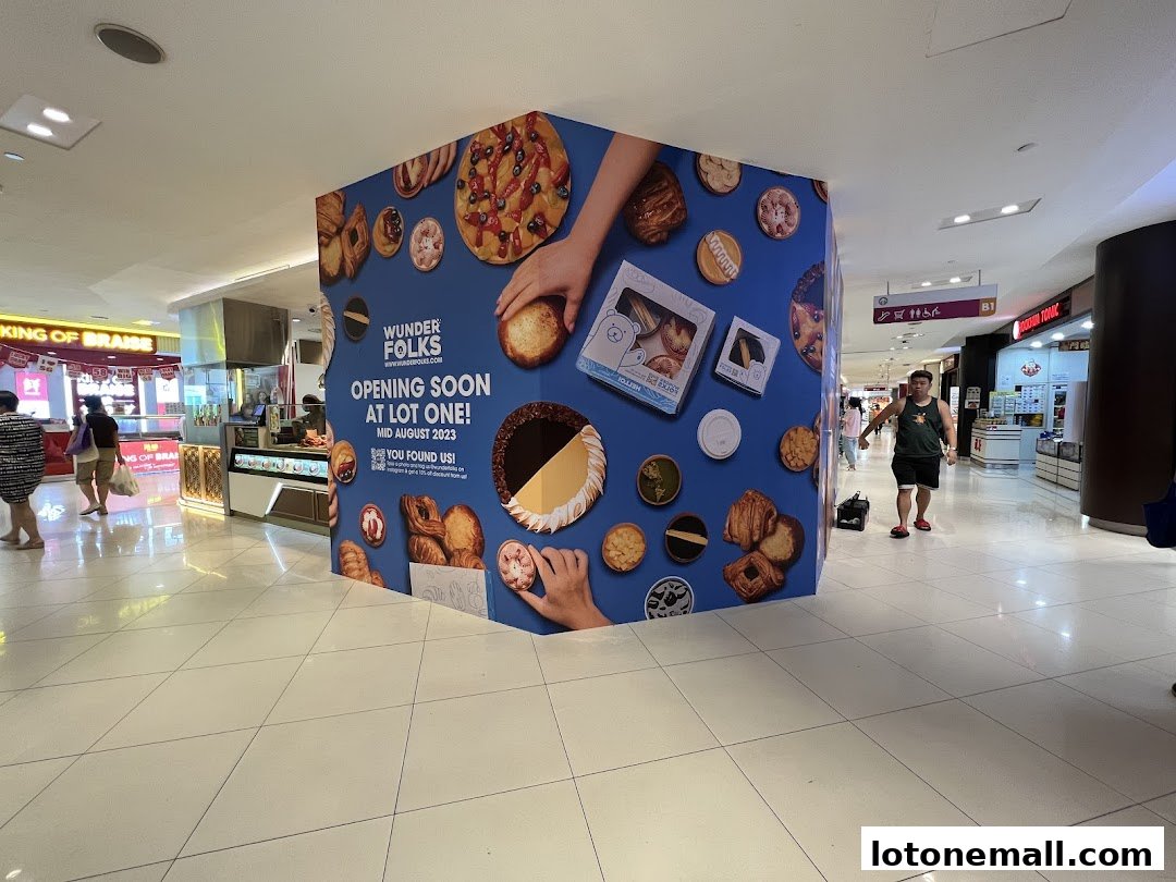 A large blue banner announcing the upcoming opening of Wunderfolks Handmade Tarts.
