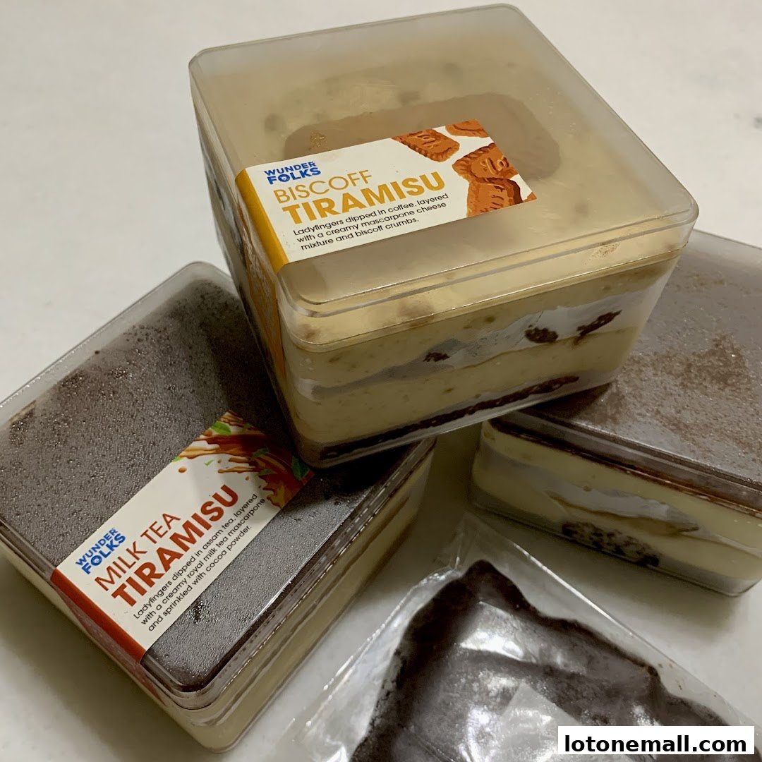 Three containers of tiramisu desserts, one Biscoff and one Milk Tea flavor.