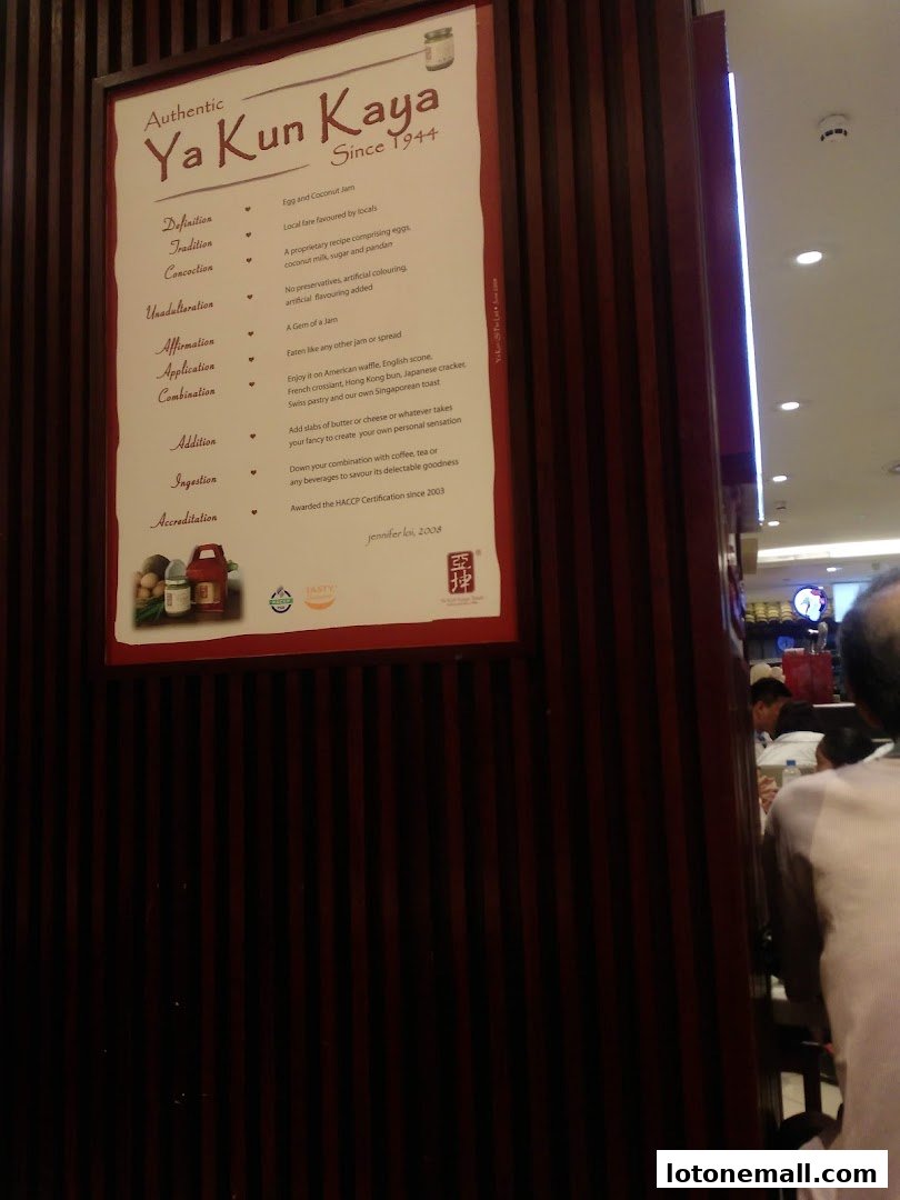 A sign detailing the history and ingredients of Ya Kun Kaya Toast.