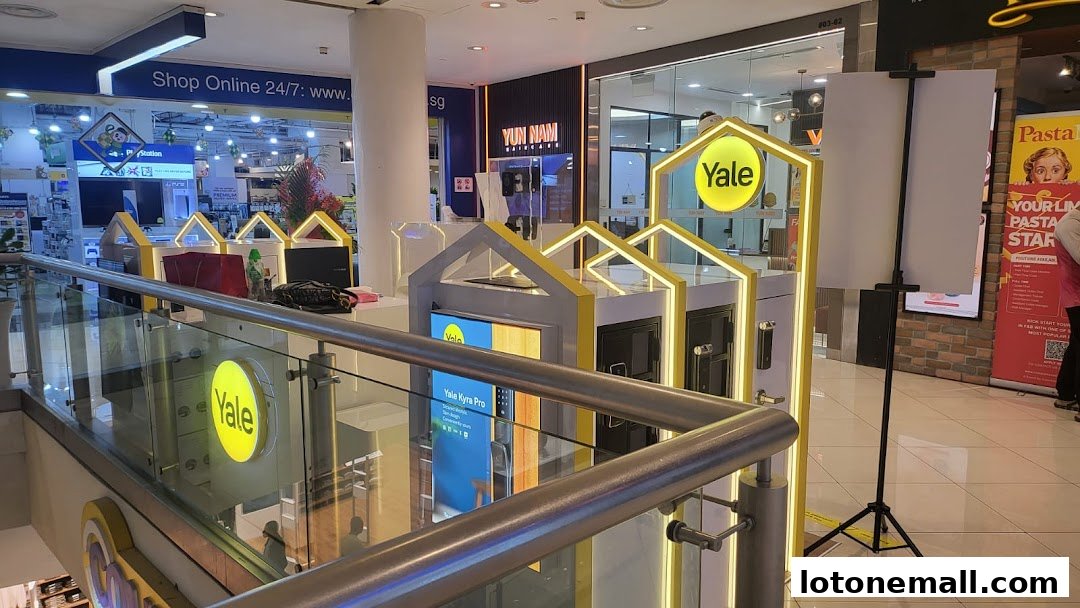 A Yale smart lock display with interactive screens and product showcases.