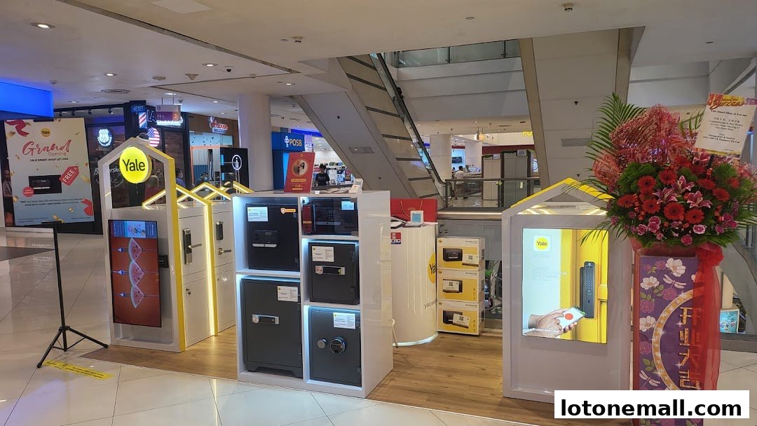 Yale Smart Shop Lot One display featuring safes and smart locks with promotional signage.