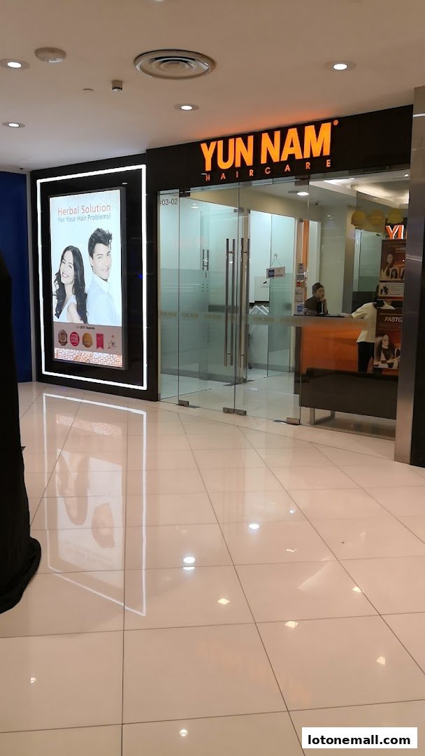 The entrance of Yun Nam Hair Care, a salon specializing in herbal hair treatments.